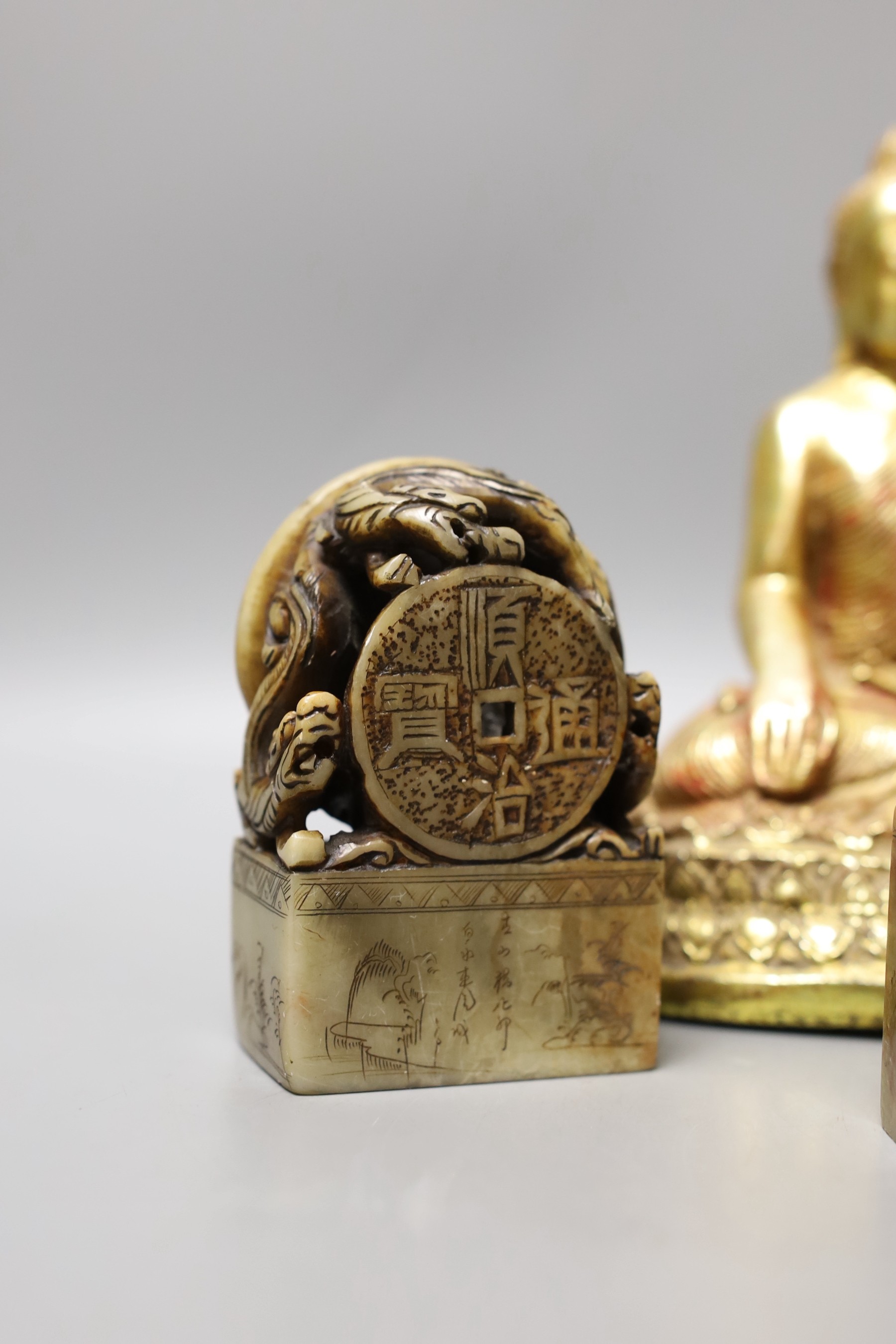 A group of Chinese soapstone carvings, a composition portable shrine and a Buddha figure (7)